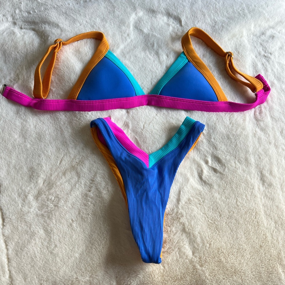 One One bikini set. Medium top and small bottom, worn once for a bachelorette!